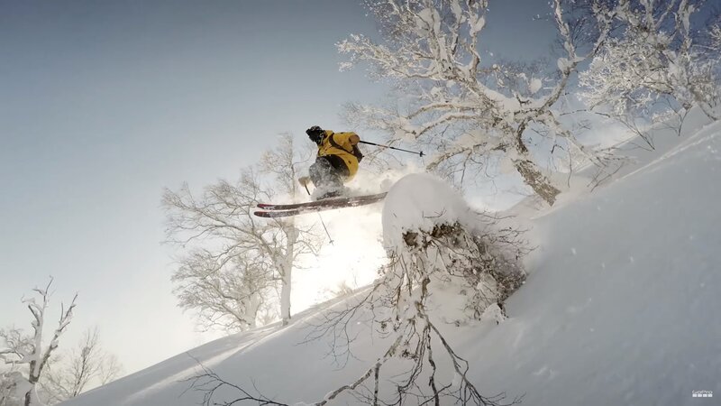 Skier in Mid-air Jump — White, Dynamic