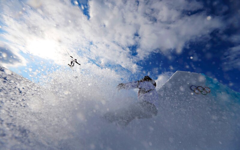 Skier in Mid-air — White, Dynamic, Afternoon