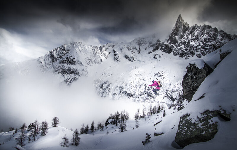 Skier in mountain jump