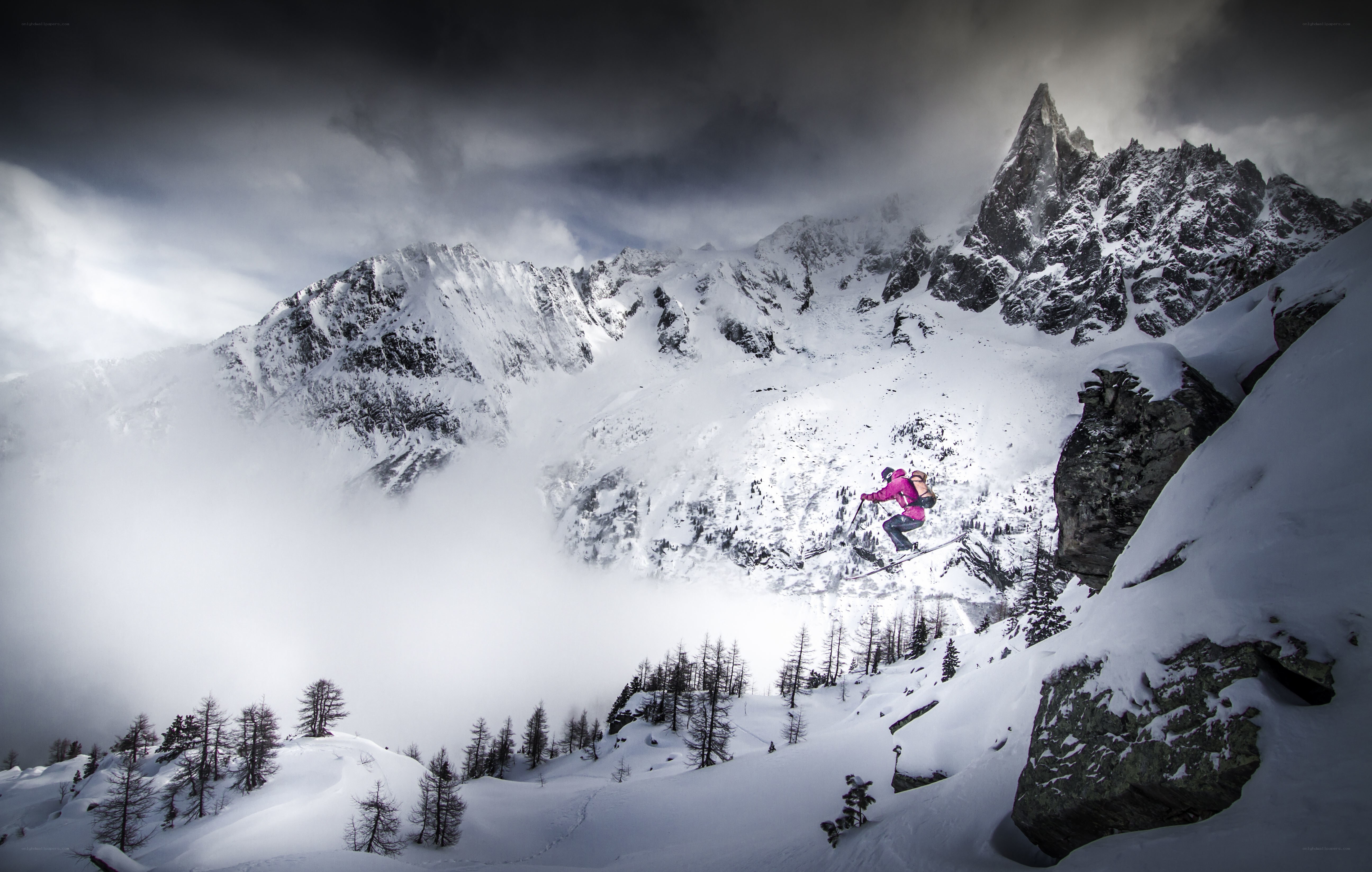 Skier in mountain jump
