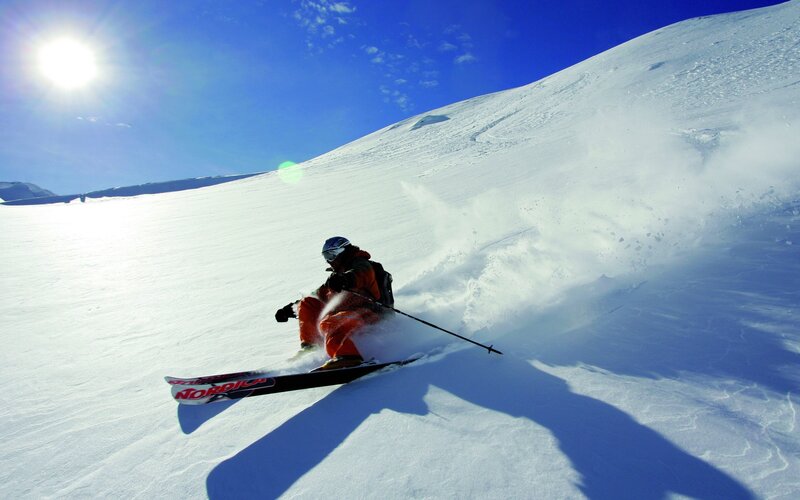 Skier in Orange Suit