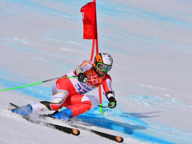 Skier in Red Suit — White