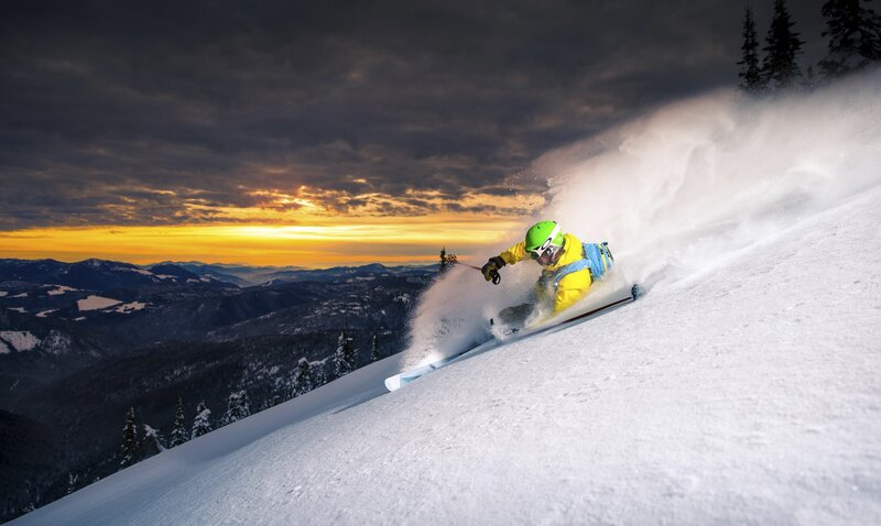 Skier in Yellow Jacket — Dramatic