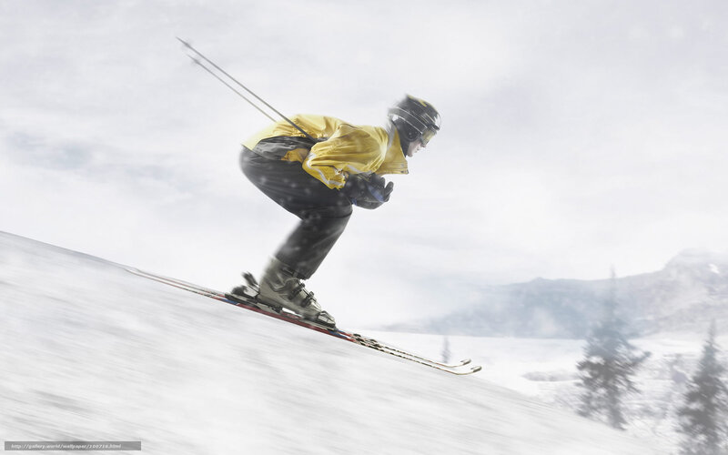 Skier in yellow jacket