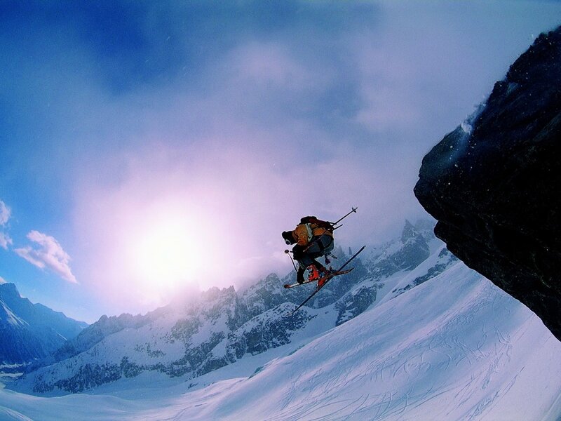 Skier Jumping Off Cliff — Blue, Dramatic