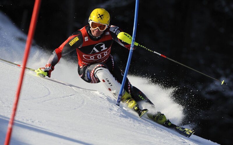 Skier navigating slalom course