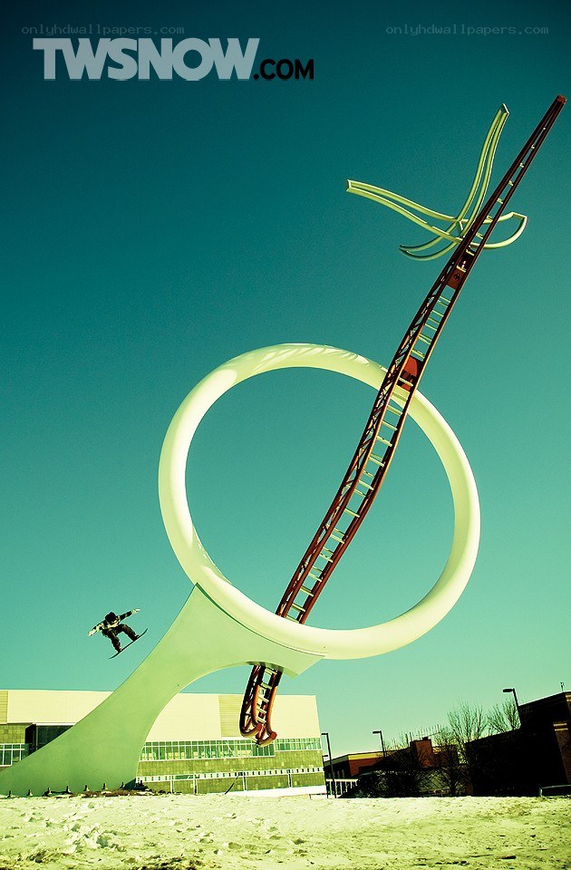 Skier near large sculpture