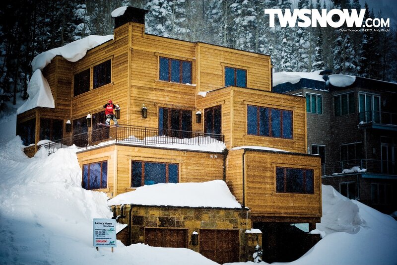 Skier on a luxury home balcony