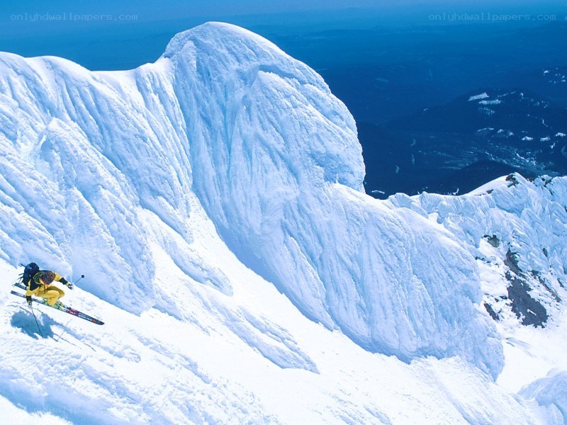 Skier on a snowy mountain