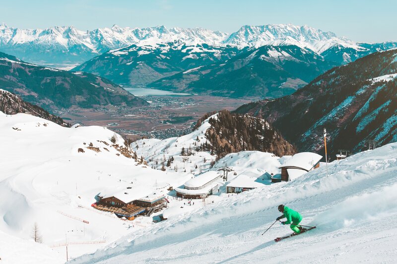 Skier on a snowy mountain slope