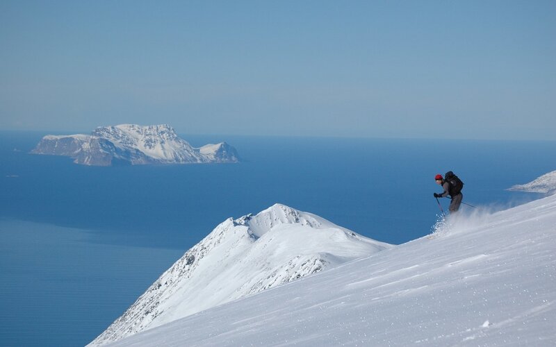Skier on a snowy mountain slope