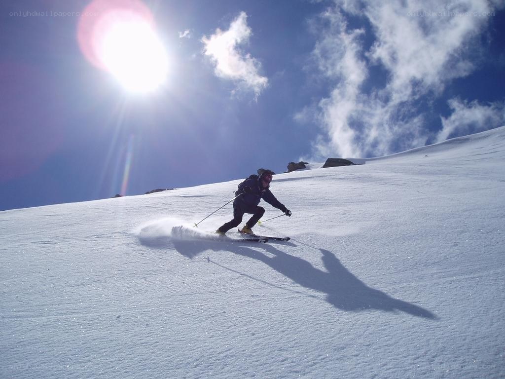 Skier on a sunny slope