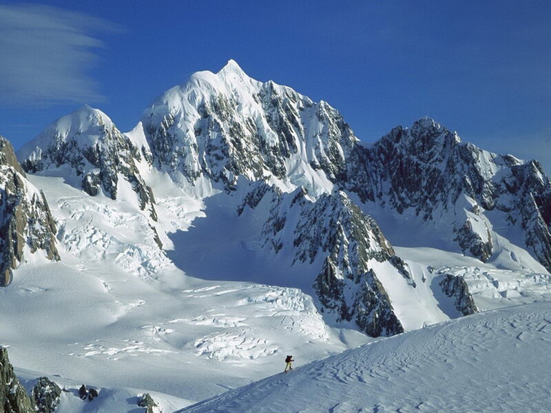 Skier on Snowy Mountain — Blue