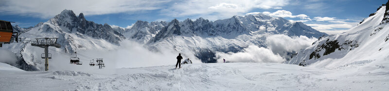 skier on snowy mountain slope