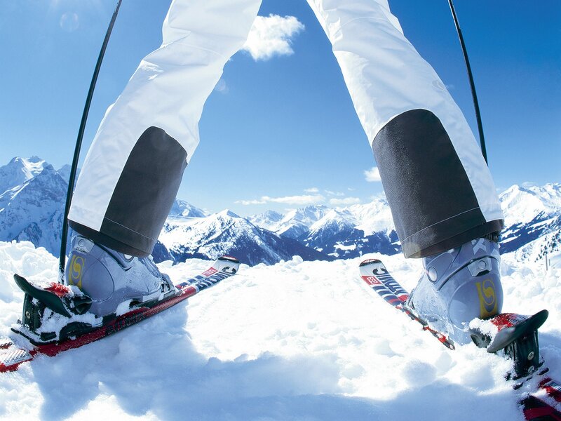 Skier on Snowy Mountain — White