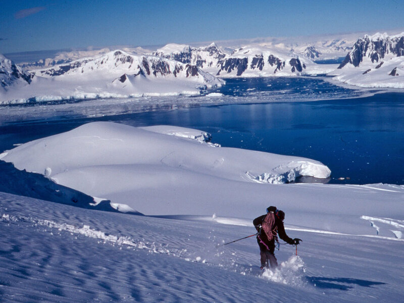 Skier on Snowy Slope — White, Cold
