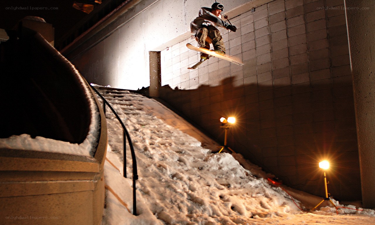 Skier performing jump at night