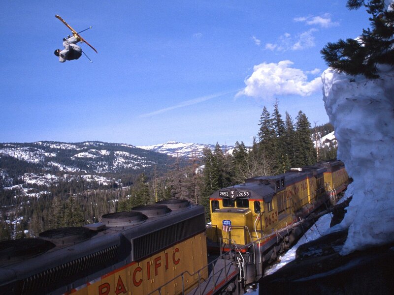 Skier Performing Jump — Yellow