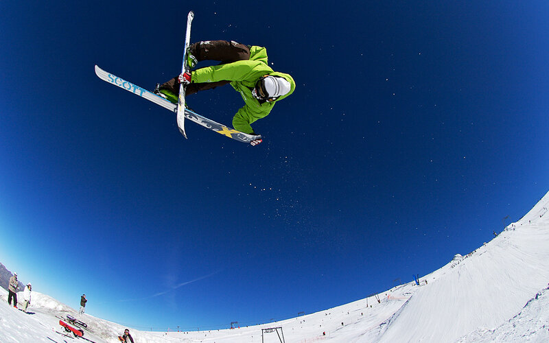 Skier Performing Trick — Blue
