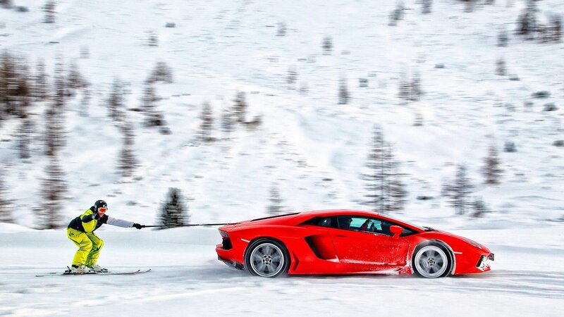 Skier Pulling Car — Red