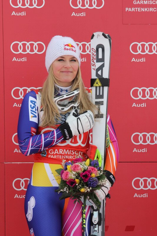 Skier with flowers and skis