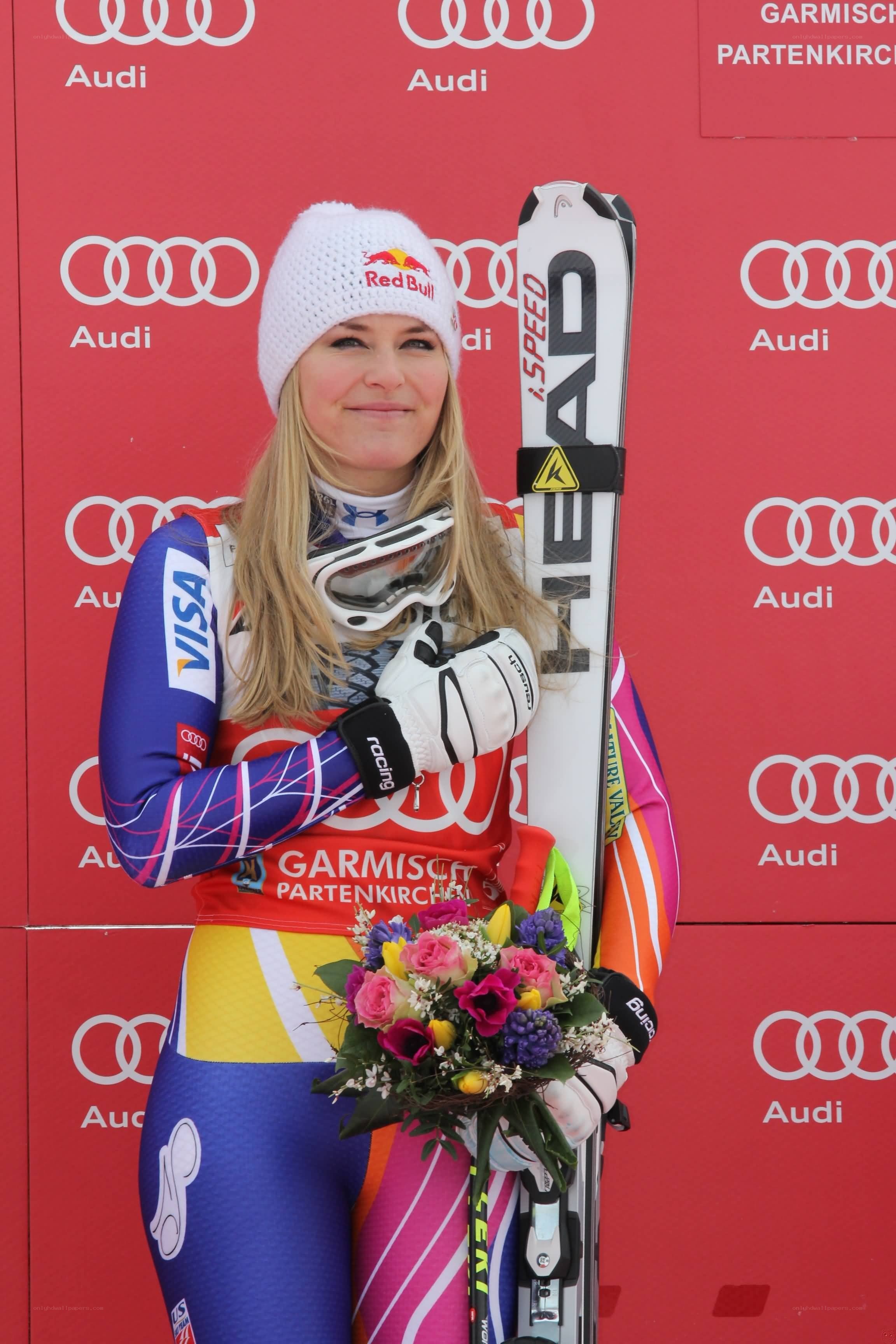 Skier with flowers and skis