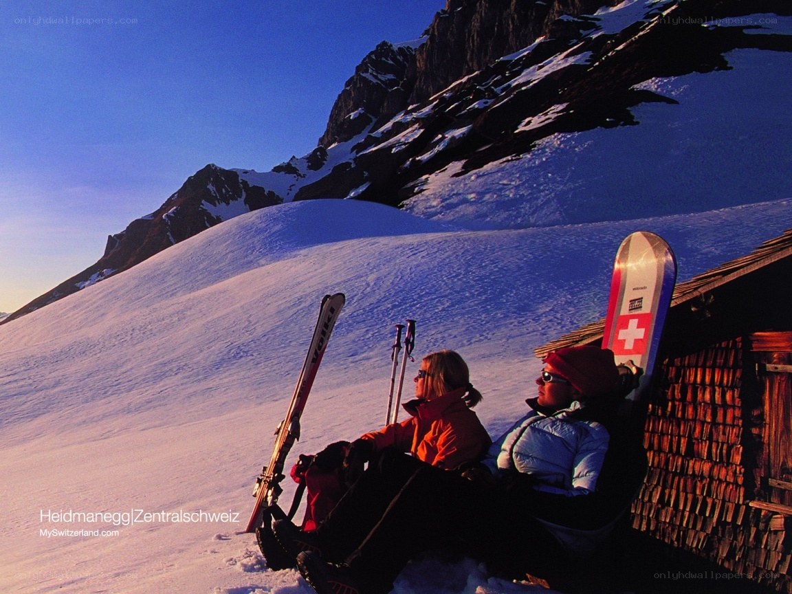 Skiers at mountain hut