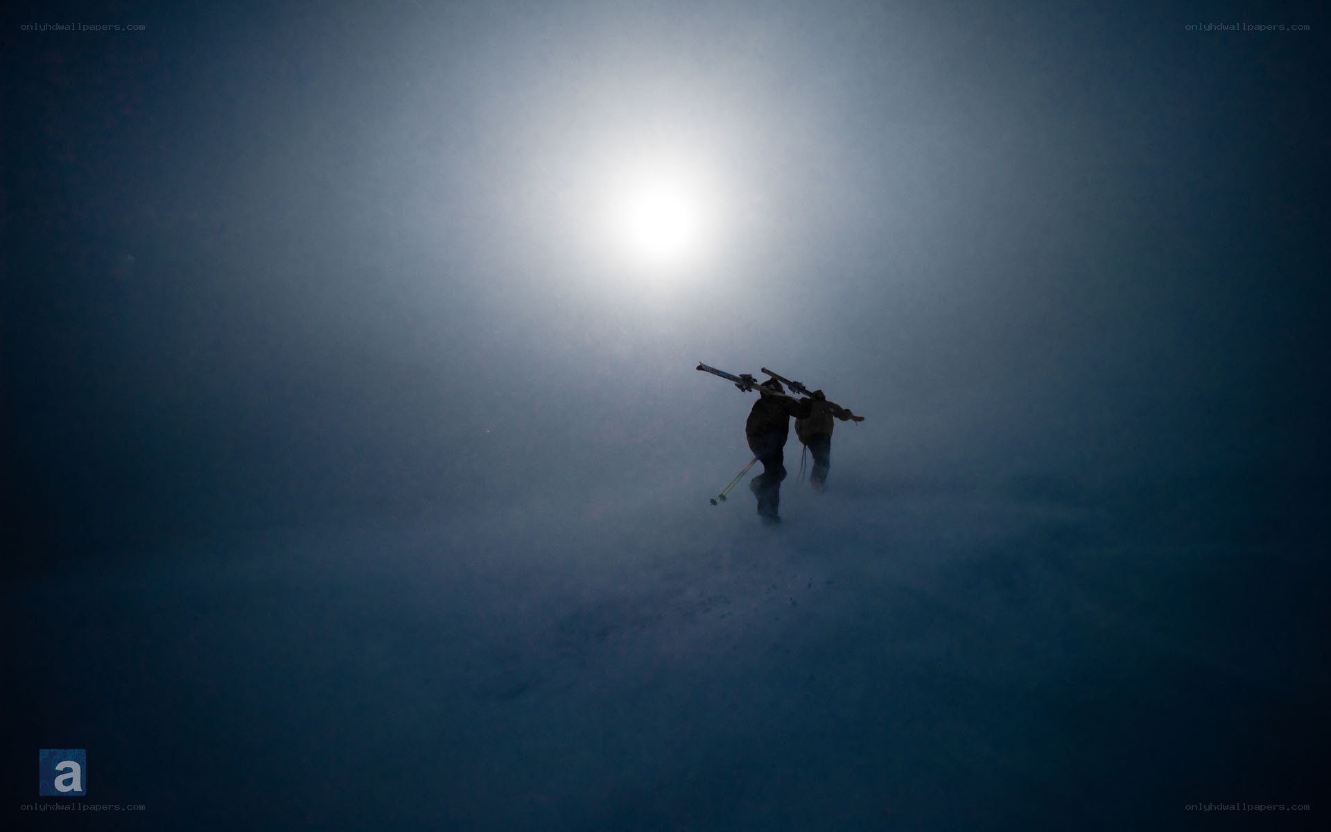 Skiers in a snowstorm
