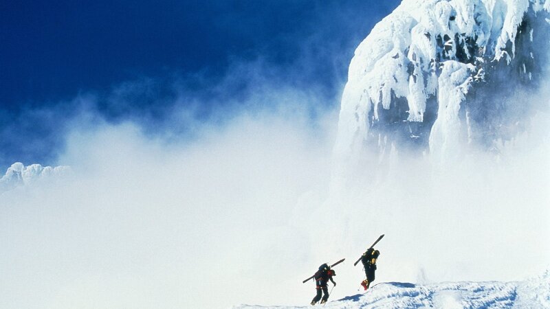 Skiers on a snowy mountain