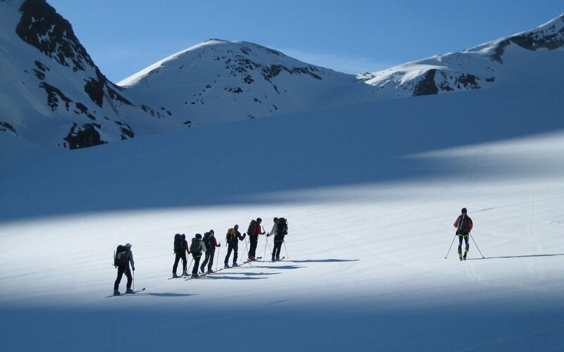 Skiers on a snowy mountain