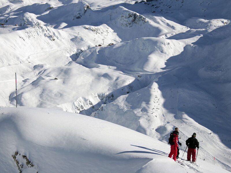 Skiers on a snowy mountain