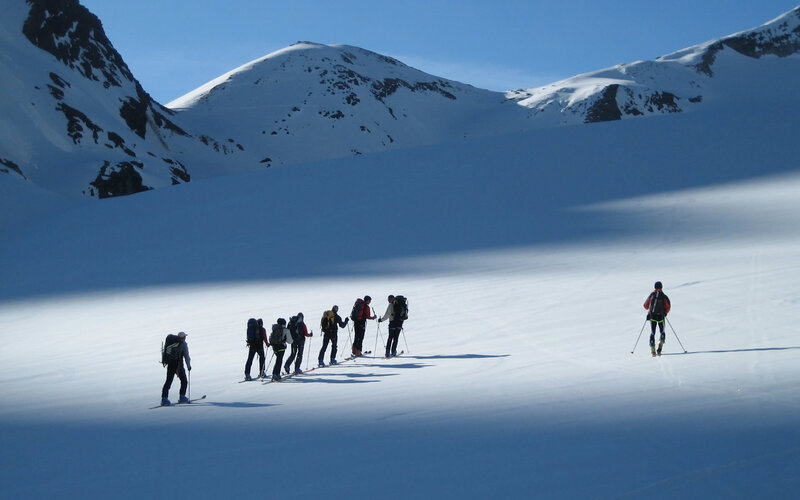 Skiers on a snowy mountain