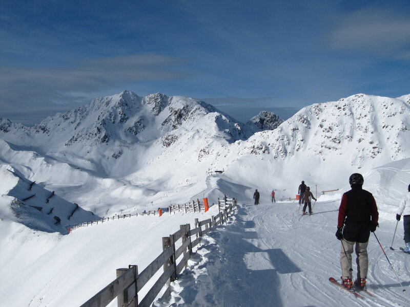 Skiers on a snowy mountain