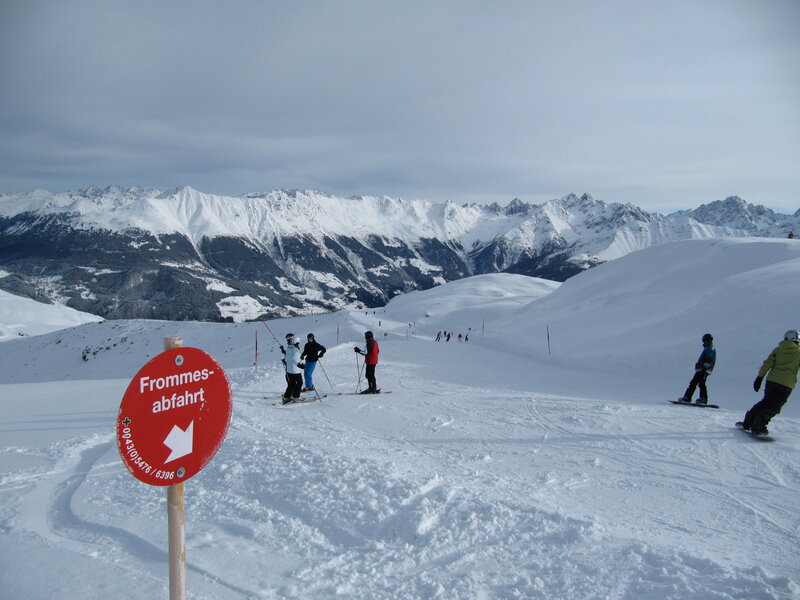 Skiers on a snowy mountain