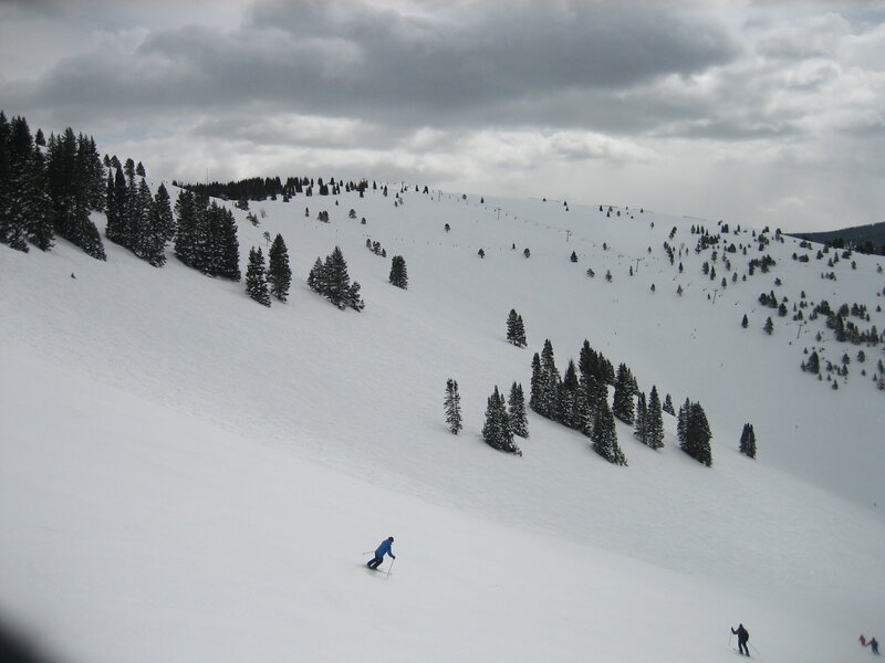 Skiers on a snowy mountain