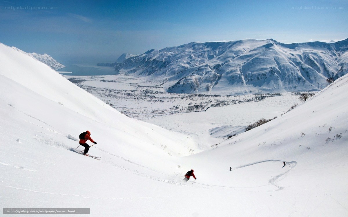 Skiers on a snowy mountain