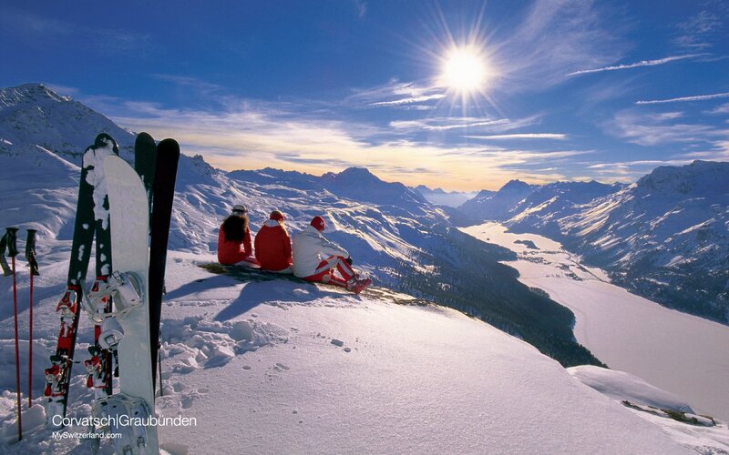Skiers on Mountain Peak — White, Serene