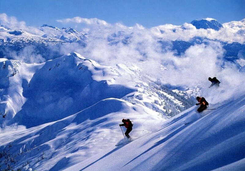 Skiers on Snowy Mountain — Blue, Dramatic