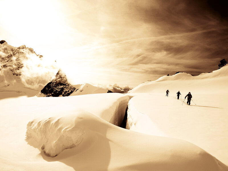 Skiers on Snowy Mountain — White