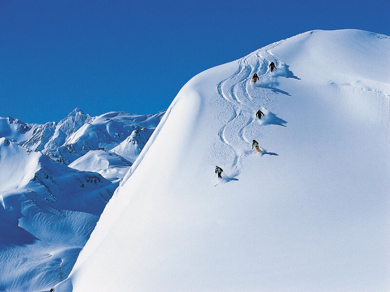 Skiers on Snowy Slope — Blue, Serene, Winter