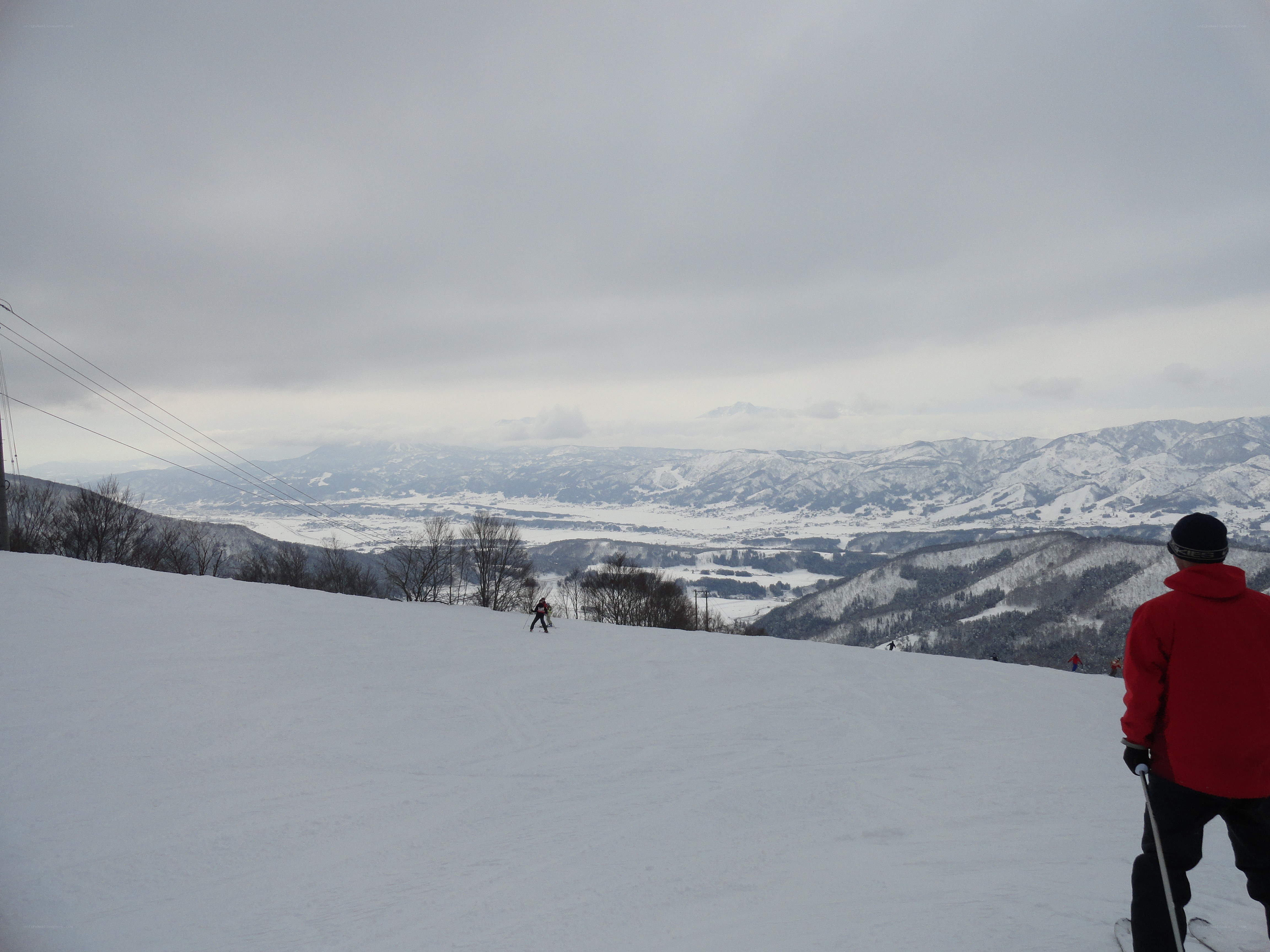 Skiing in a snowy mountain valley
