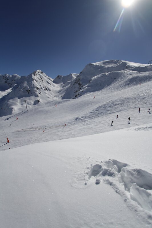 Skiing on a sunny mountain slope