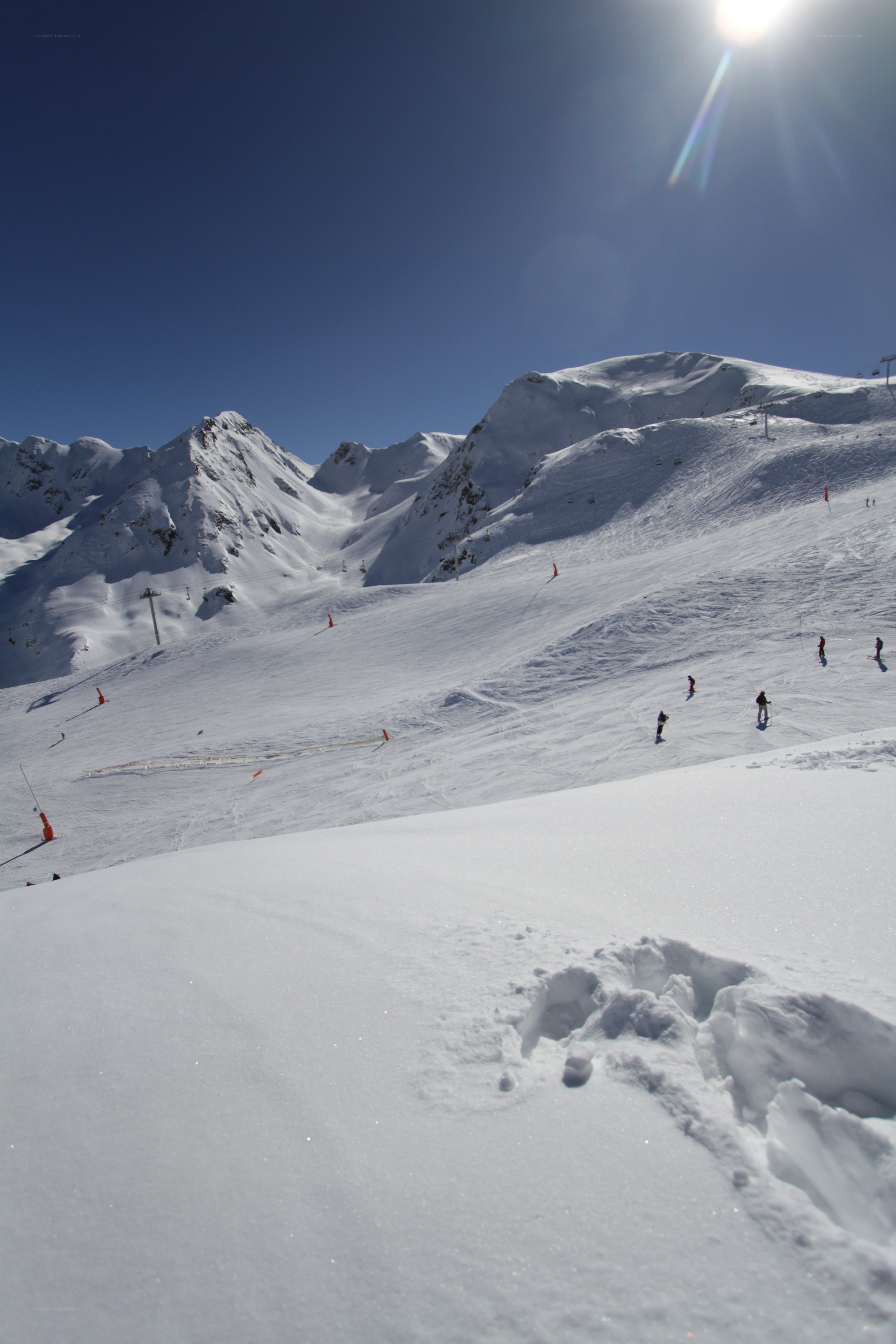 Skiing on a sunny mountain slope