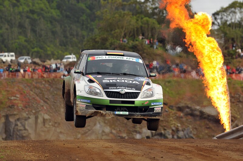 Skoda rally car in mid-air jump