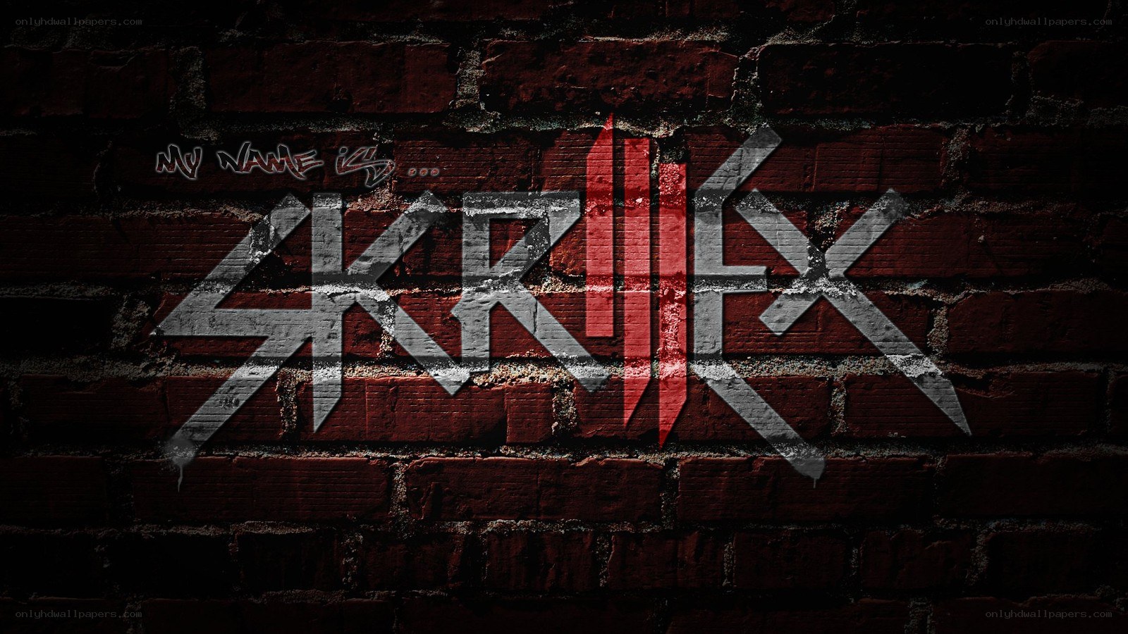 Skrillex graffiti on brick wall