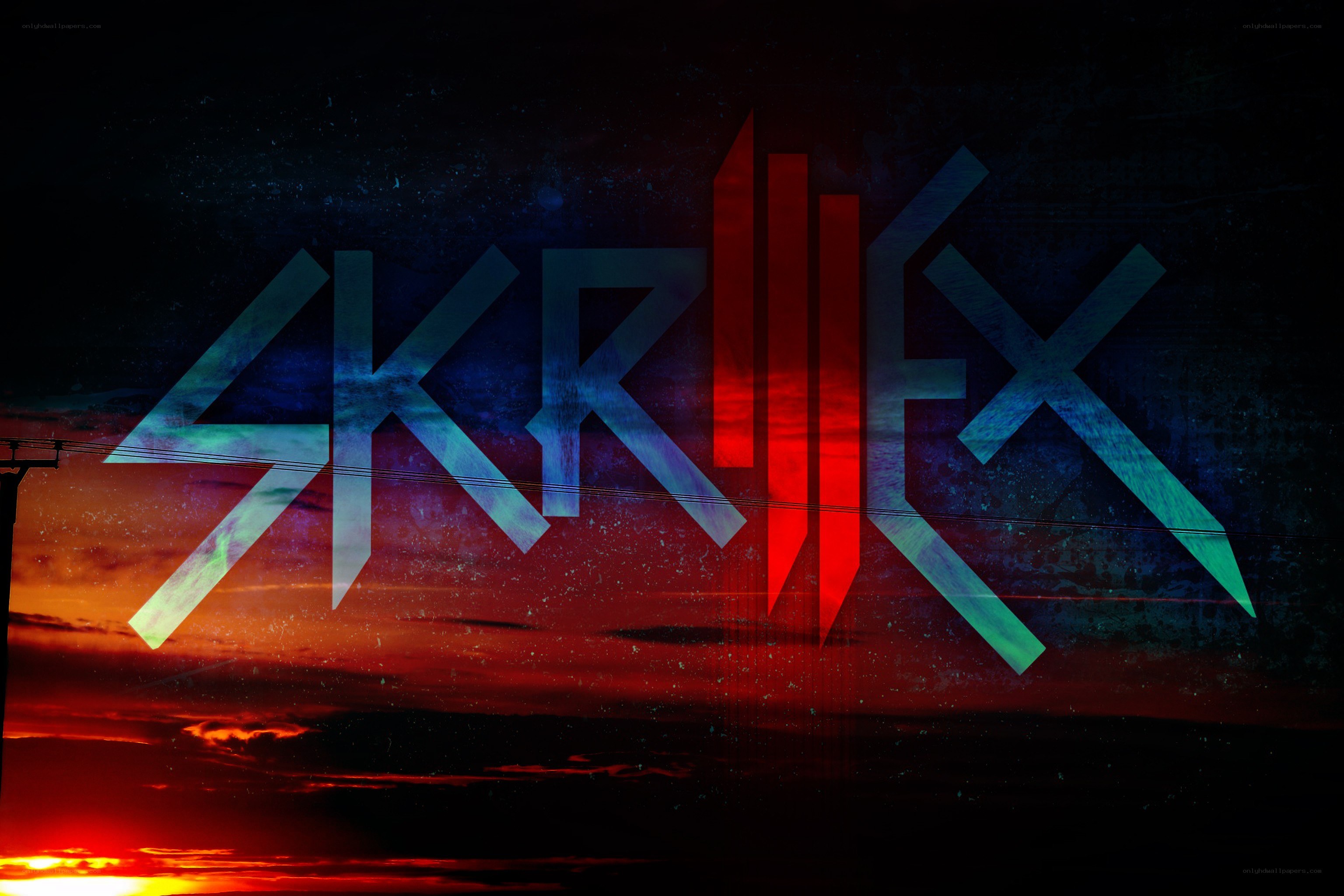 Skrillex logo at sunset