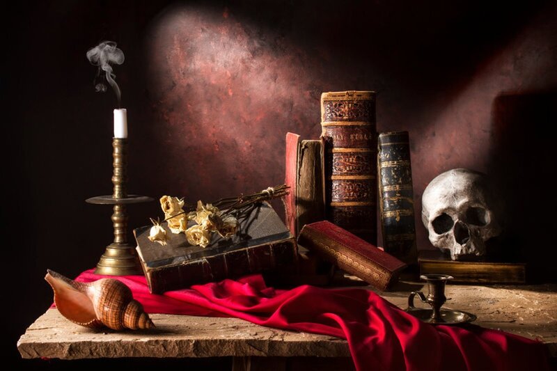Skull and Books on Table