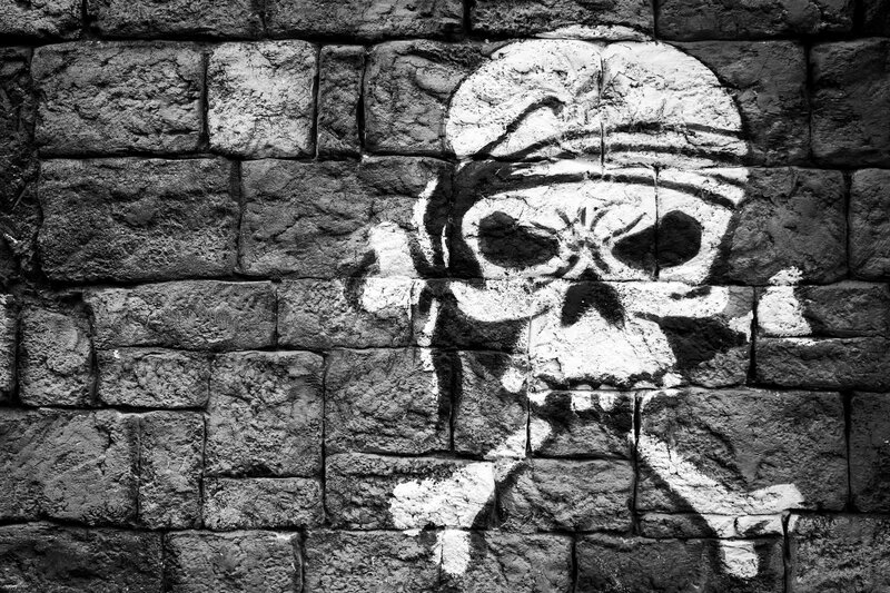 Skull and Crossbones Graffiti — Black