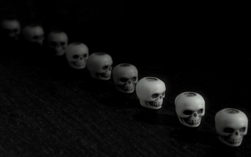 Skull beads in a line