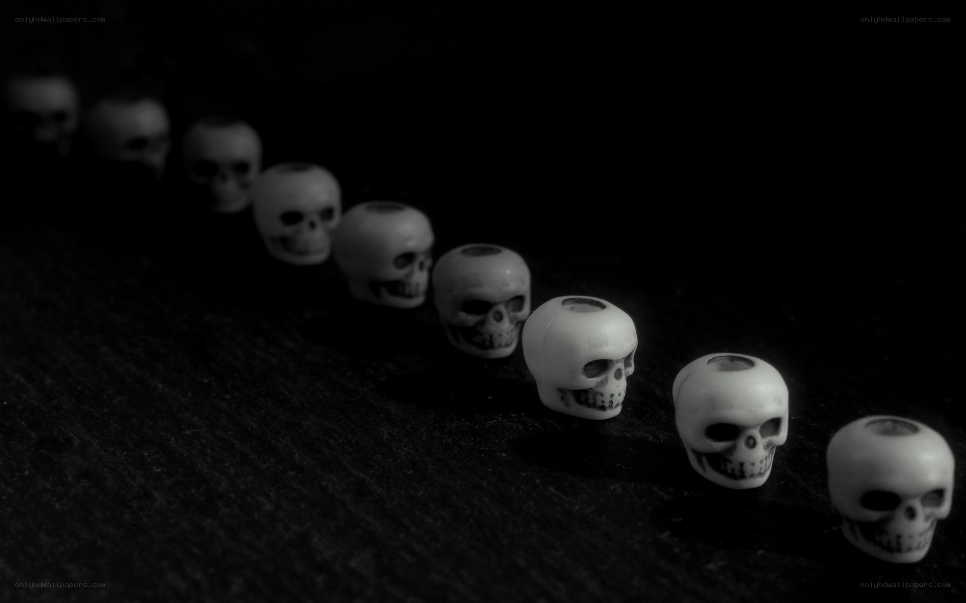 Skull beads in a line